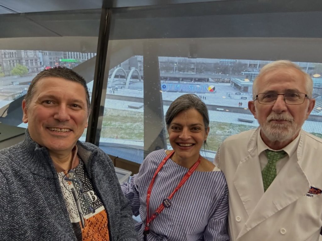 Maria Voutsinas with community members inside Toronto City Hall