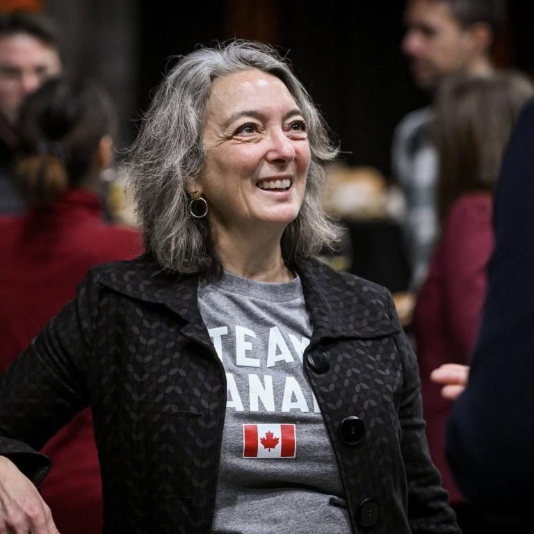 Julie Dabrusin smiling at a community event